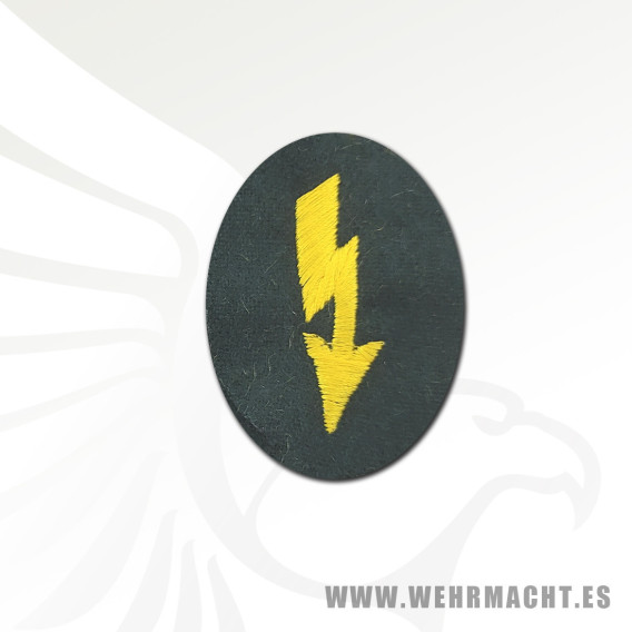 Distintivo de brazo para auxiliares de comunicaciones